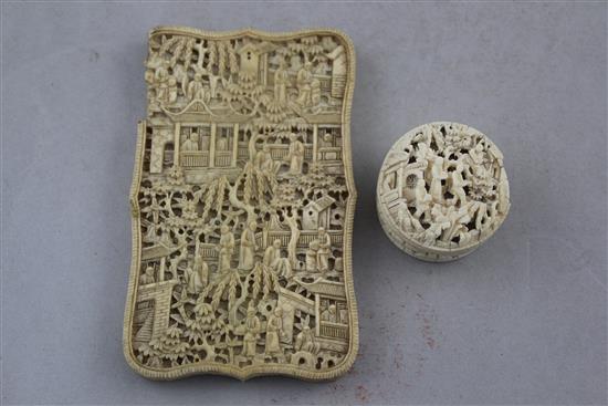 A Chinese export ivory card case and a similar circular box containing mother of pearl counters, 19th century, 11cm. and 4cm., slight d